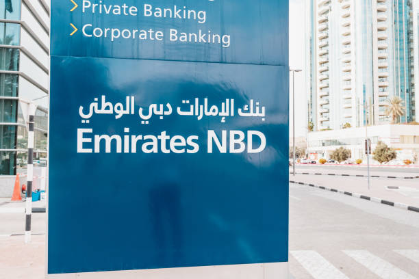 Smiling customer opening a zero balance account at Emirates NBD